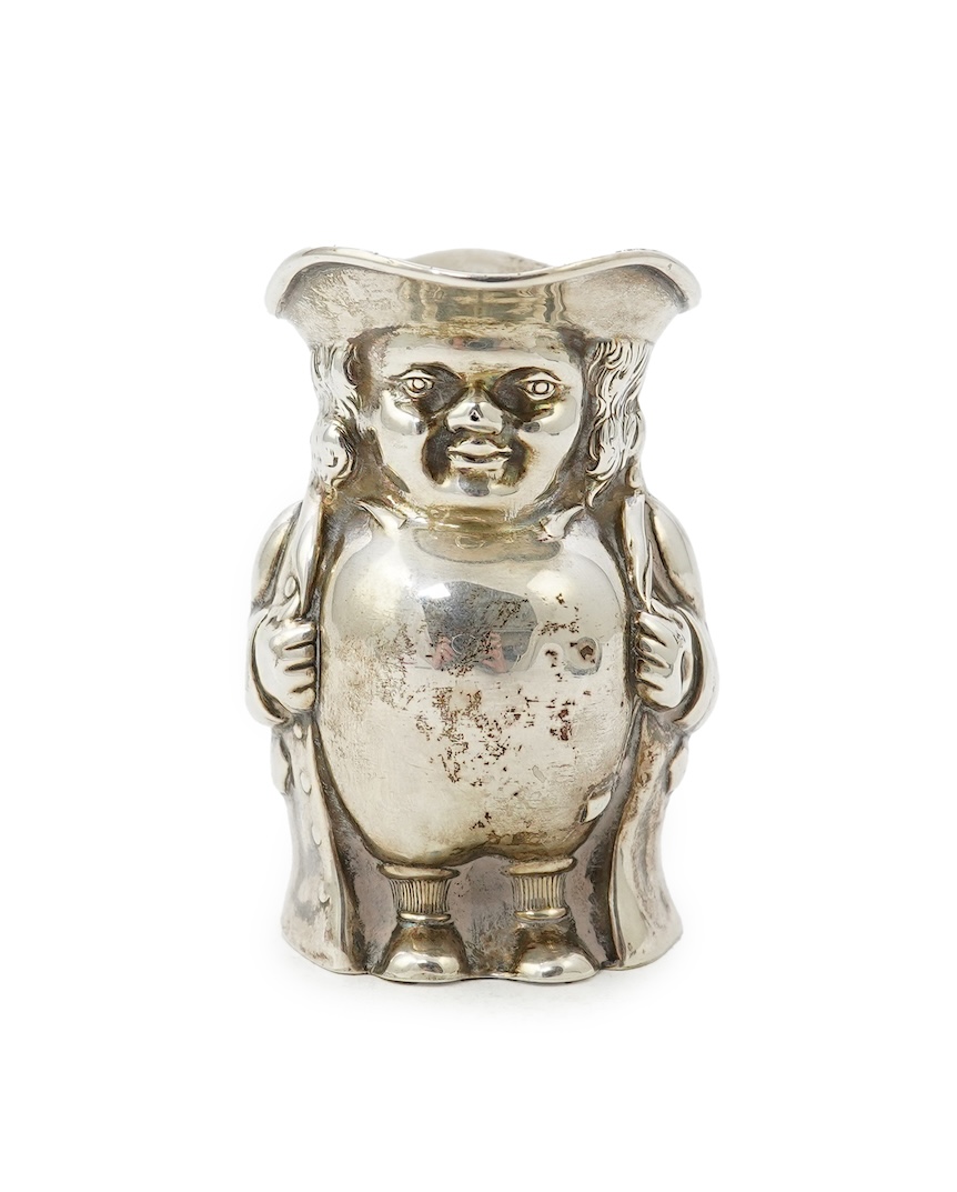 A George V novelty silver cream jug, modelled as a Toby Jug, by Hayes & Co